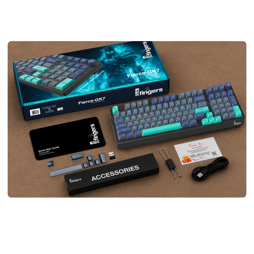 QuikFINGERS Fierce GK7 compact gaming keyboard kept beside the packaging and other accessories 